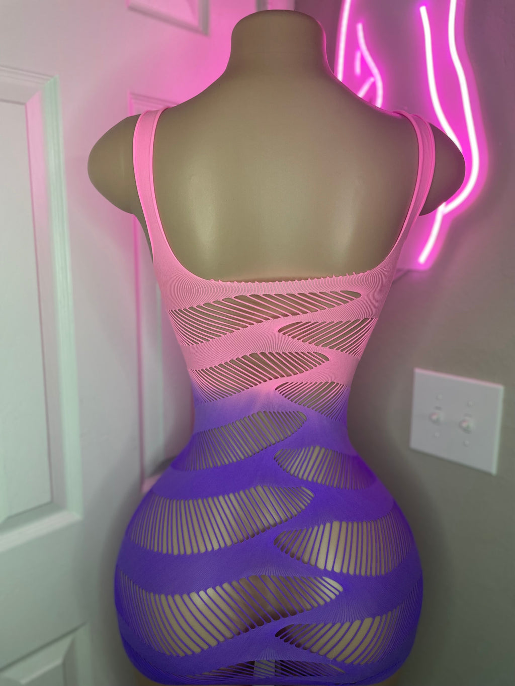 Pink to purple ombre slash-cut mini dress back view showing open-back slash detail