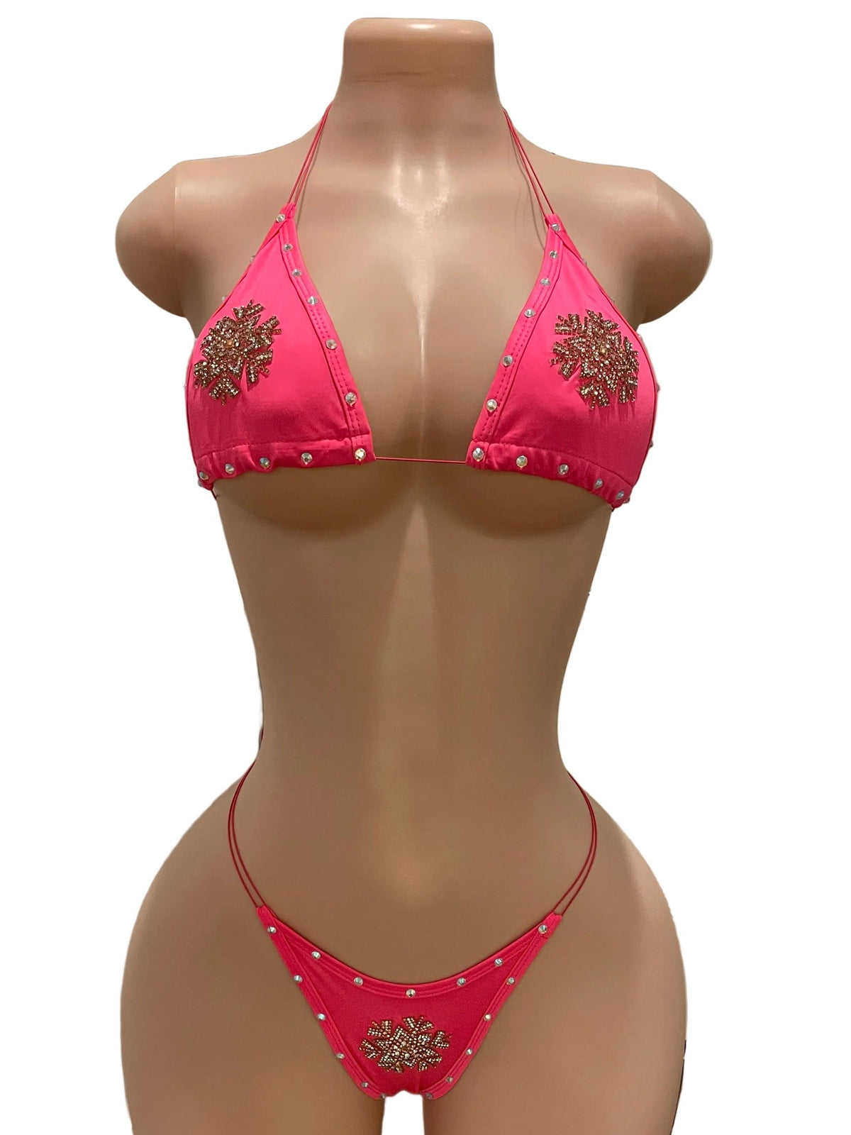 Front view of pink rhinestone snowflake bikini set on mannequin